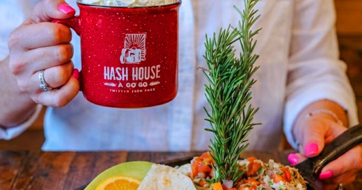A family dining at Hash House A Go Go Flamingo Crossings coffee mug with twisted farm food brunch dish at Flamingo Crossings Town Center in Winter Garden Florida