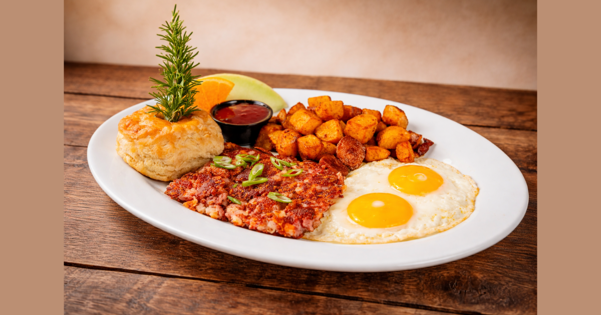 Old School corned beef hash with eggs potatoes and biscuit, a seasonal limited menu item at Hash House Flamingo Crossings breakfast in Winter Garden
